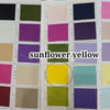 A swatch of sunflower yellow fabric is shown alongside various colored fabric samples.