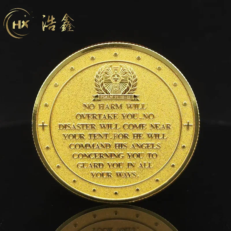 A gold medal coin featuring an emblem and text on its surface.