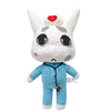 A blue plush toy resembling a dog with white fur and large eyes, featuring a red cross on its forehead.