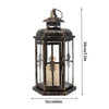 A vintage Nordic iron candle lantern with glass panes, featuring a dark finish and decorative metalwork.