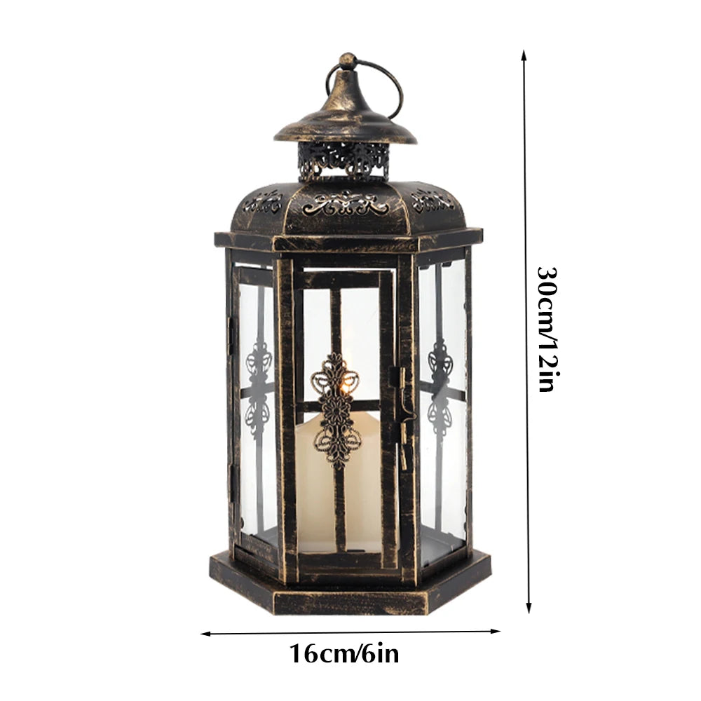 A vintage Nordic iron candle lantern with glass panes, featuring a dark finish and decorative metalwork.