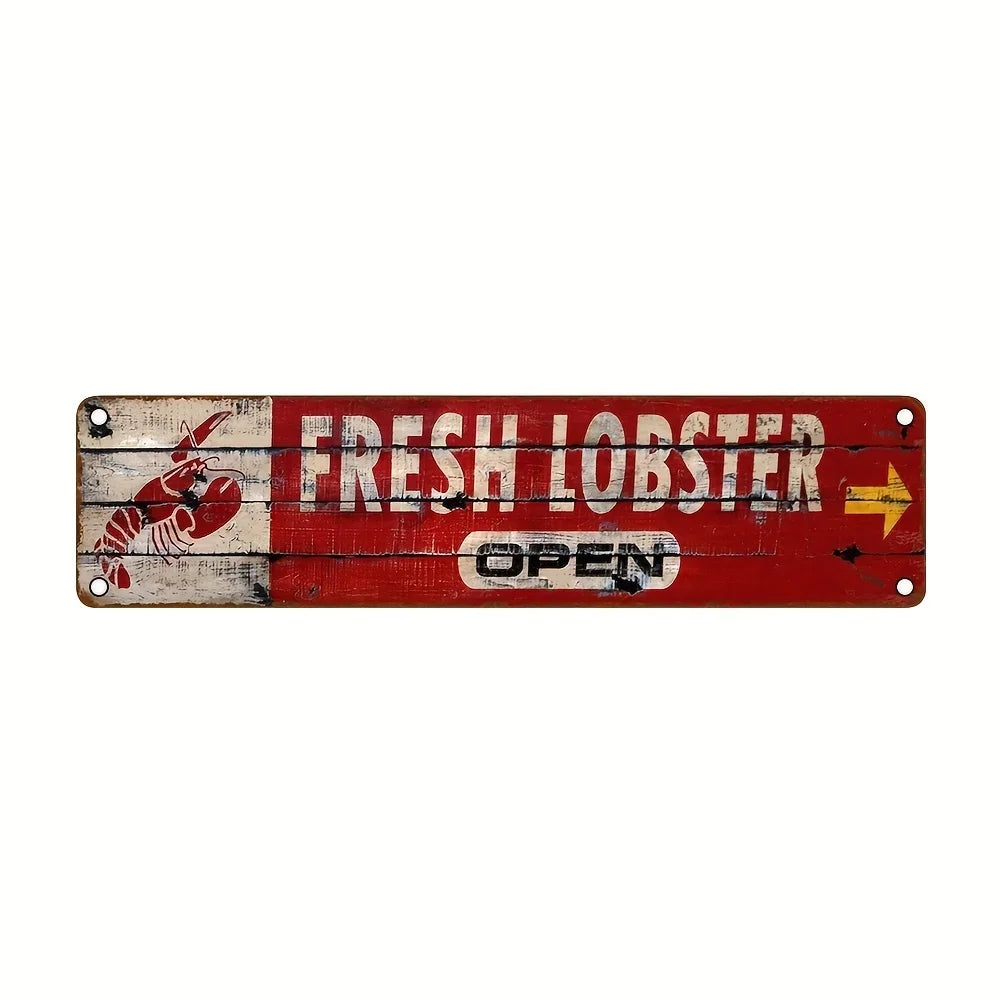 A weathered red metal sign for a fresh lobster business with an arrow pointing right.