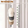 A white baseball cap is hanging on a clothes rack using a hat storage clip system.