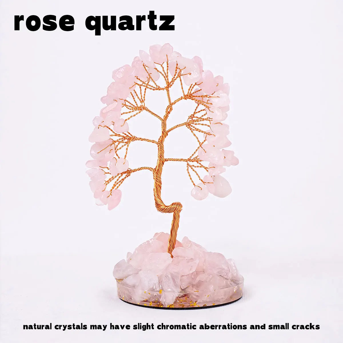 A pink rose quartz crystal tree stands on a base, showcasing natural crystals with slight chromatic aberrations and small cra