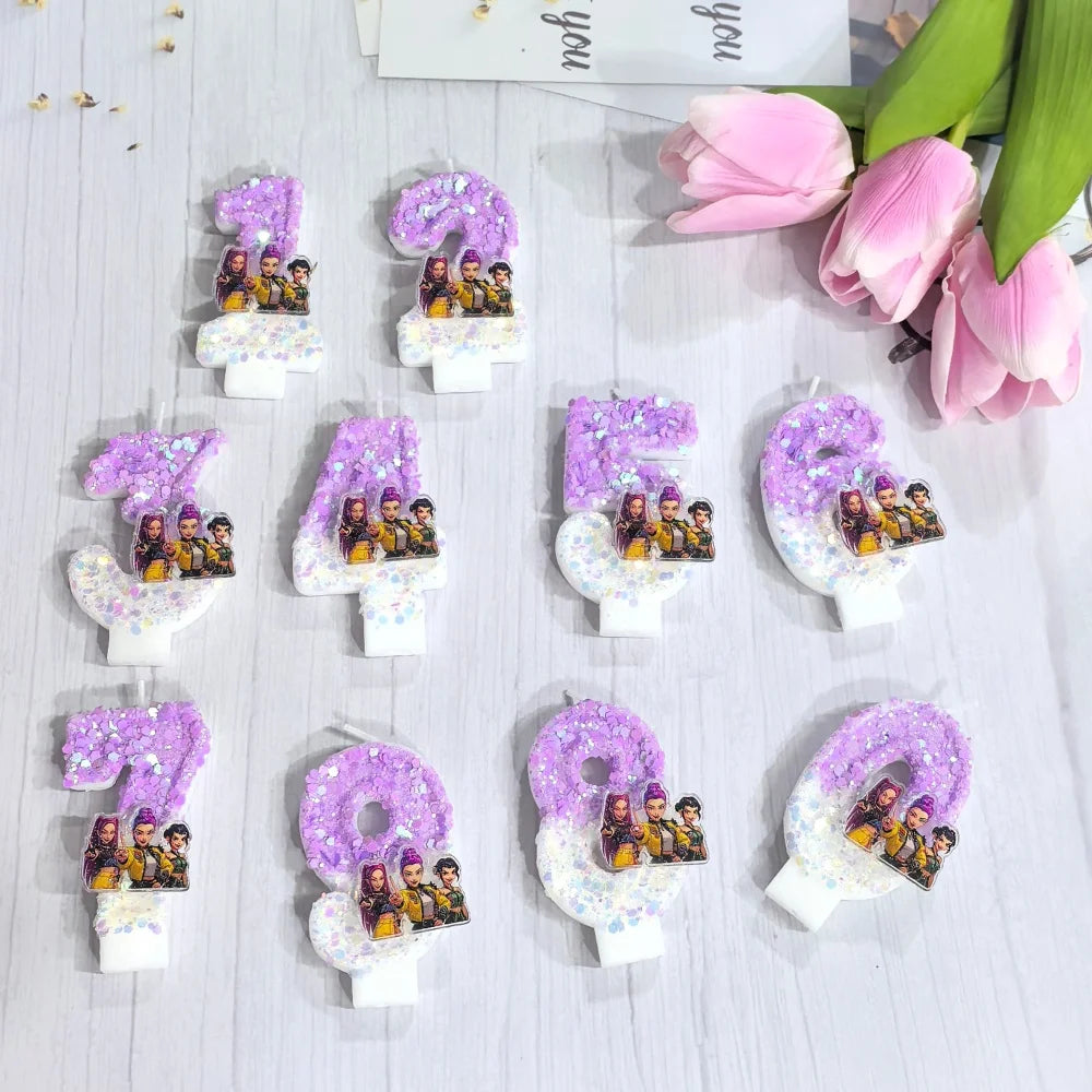 A collection of purple and gold numbered character birthday candles on a white surface.