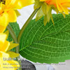 A close-up of a yellow sunflower flower and green leaf with built-in wire structure.