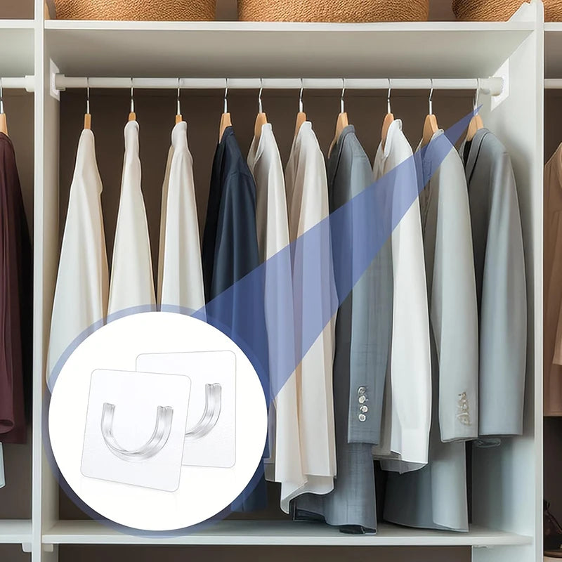 A display of four self-adhesive curtain rod brackets for hanging curtains.