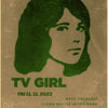 A vintage poster featuring a portrait of a woman with dark hair and the text TV GIRL and performance details.