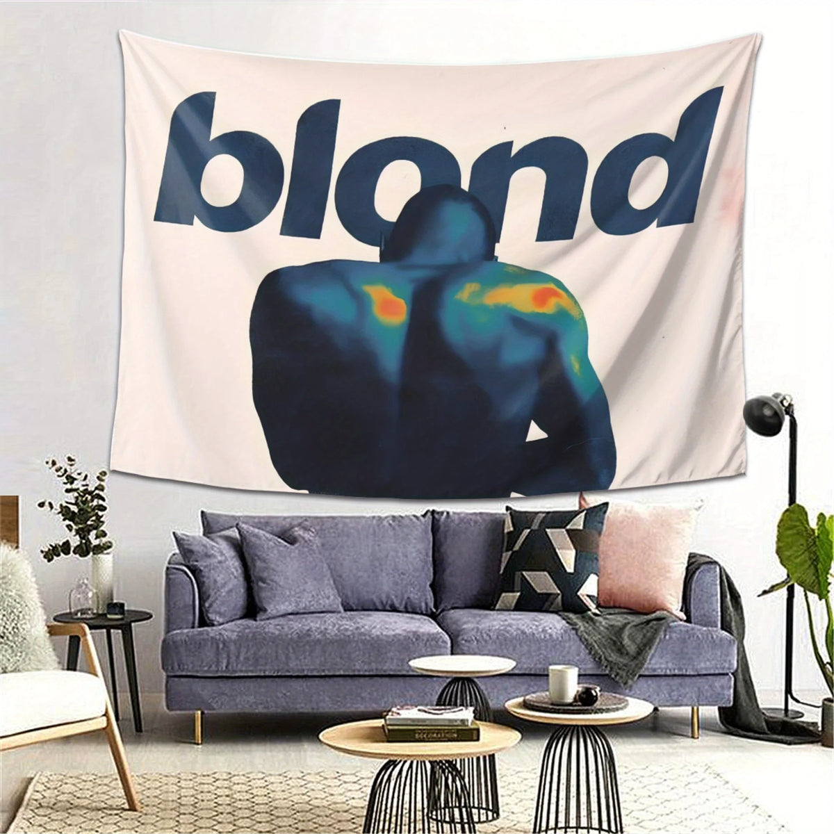 A large tapestry featuring a silhouette of a person in blue and yellow against a light background.