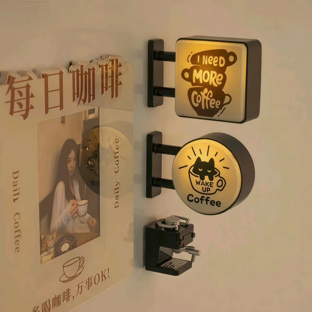 Magnetic fridge decor featuring a glowing sign that says I Need More Coffee and Wake Up Coffee