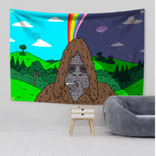 A tapestry wall hanging featuring a stylized, furry monster face against a colorful sky and rainbow background.