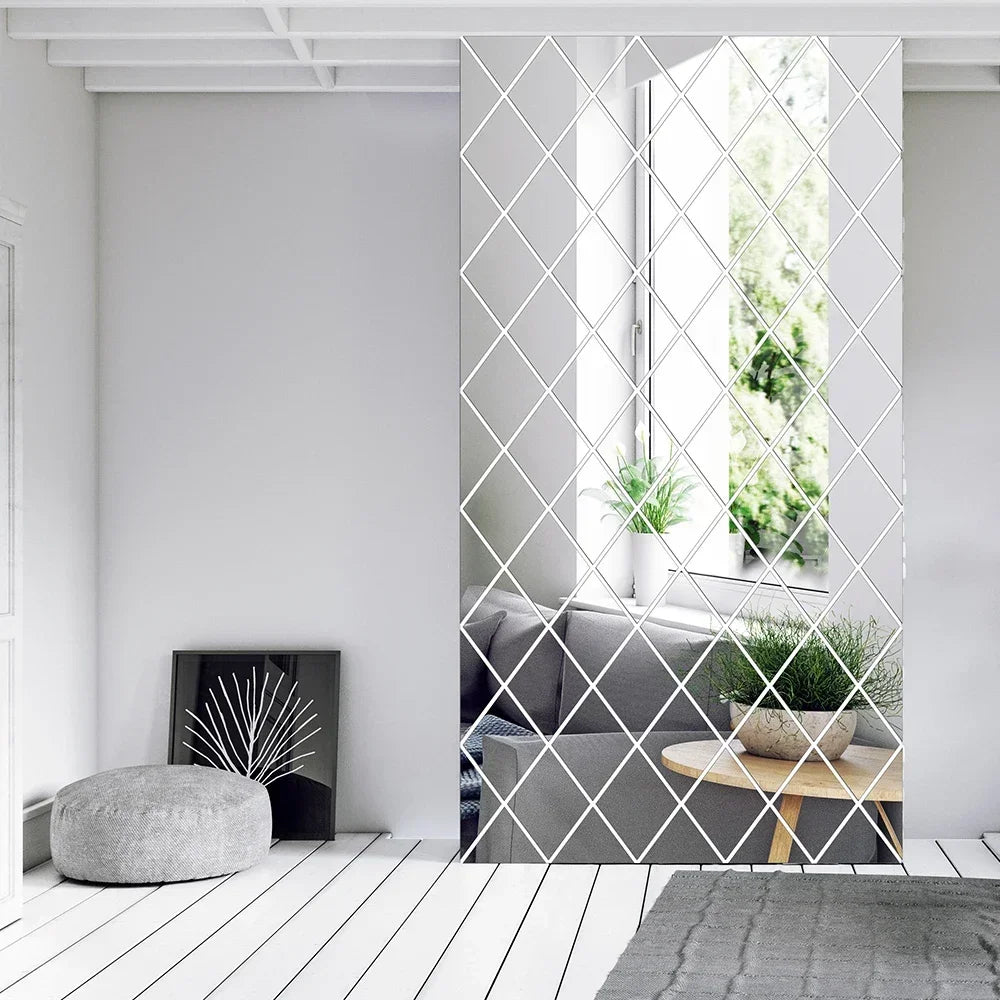 A modern interior featuring a gray sofa and a diamond-patterned mirror partition with natural light.
