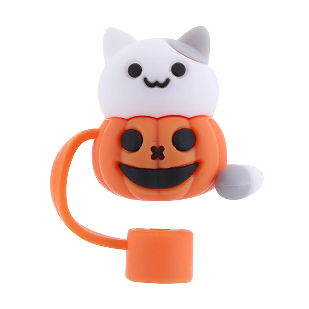 A white silicone straw cover shaped like a smiling cat is shown with an orange handle and a silicone tip.