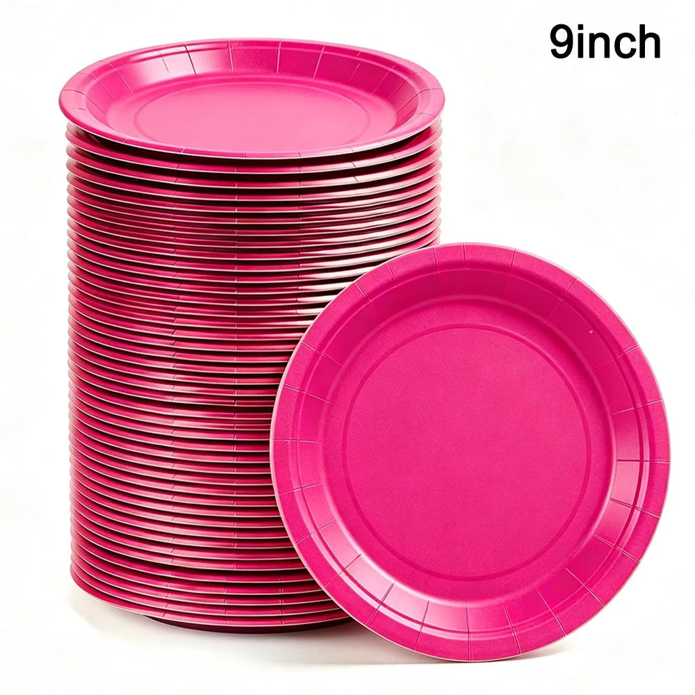 A stack of pink disposable paper plates with one plate displayed separately.