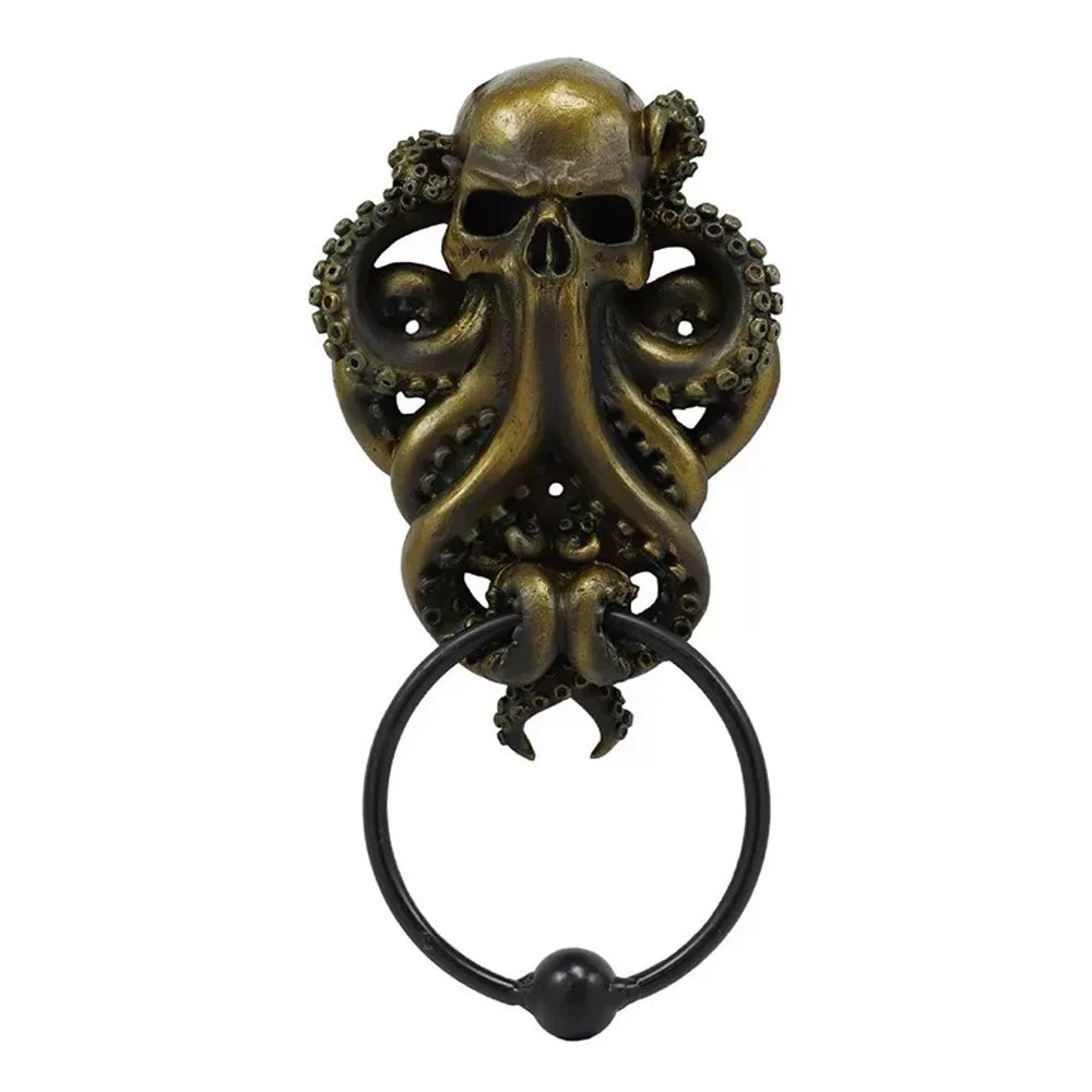 A bronze octopus skull door knocker featuring intricate detail and a cast iron ring.