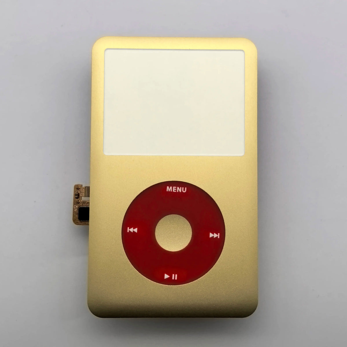 A gold-colored iPod front faceplate with a red menu button and clickwheel replacement kit.