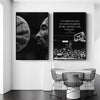 A framed piece of wall art featuring a black and white photograph of a basketball player's profile and text about success.