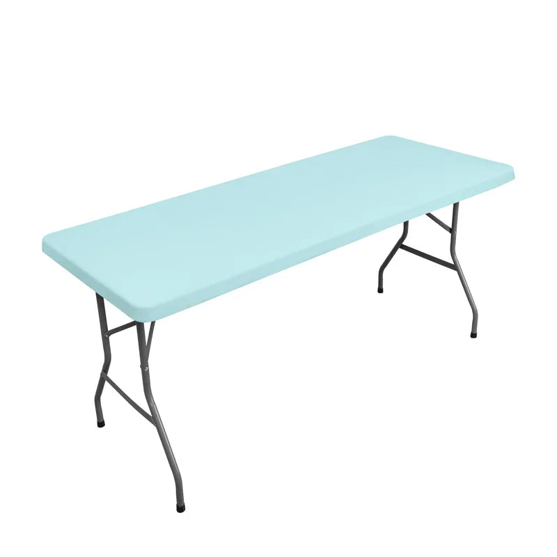 A light blue stretch tablecloth dining table with black metal legs.