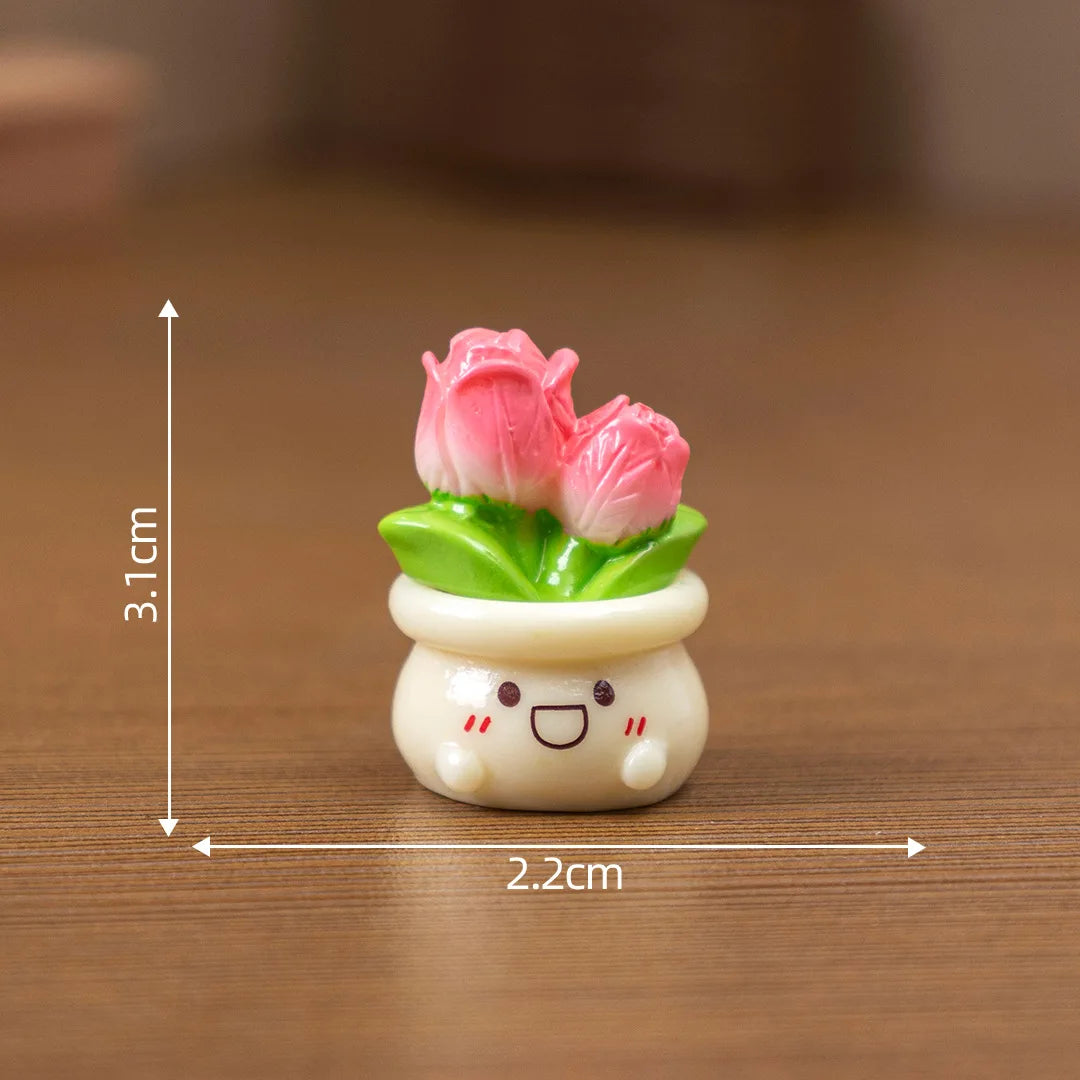 A small white ceramic charm shaped like a smiling face holding pink rose flowers.