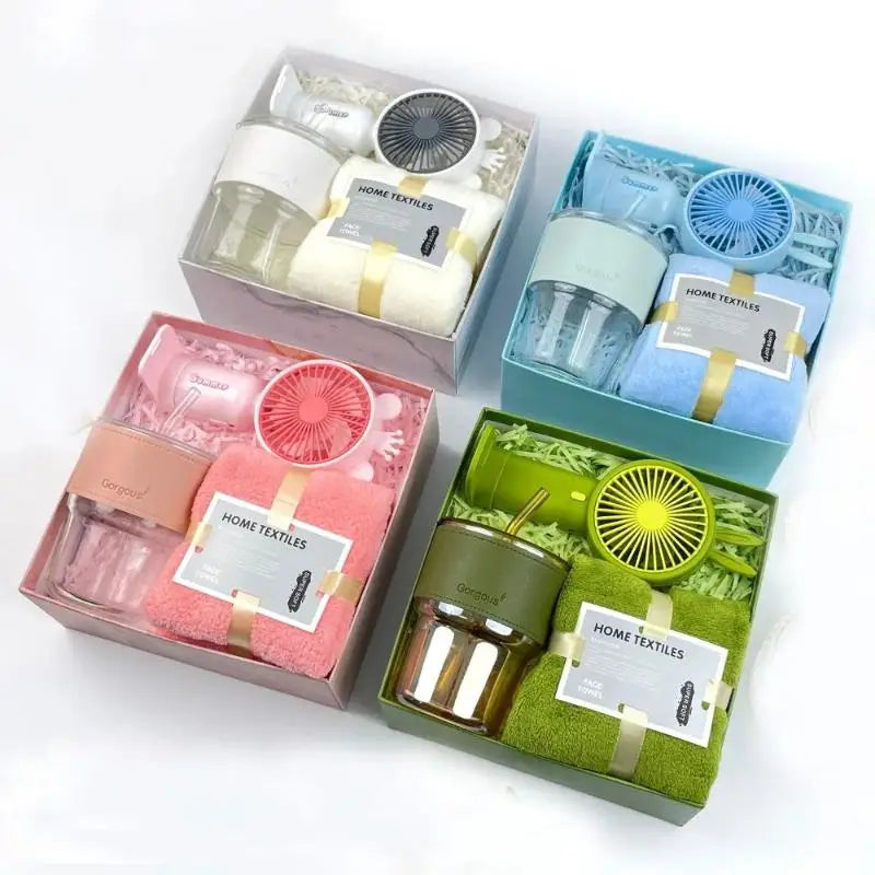 A gift set containing a tumbler, towel, and UPF sun protection in various shades of blue, pink, and green.
