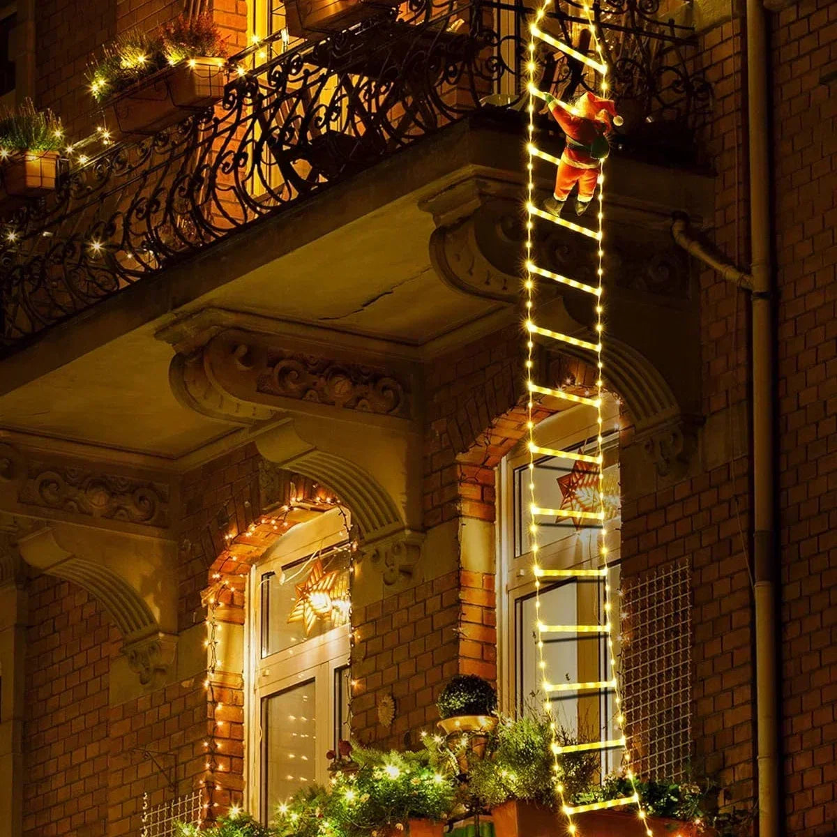 A vertical string of warm yellow Christmas lights shaped like a ladder, with an orange Santa figure at the top, decorating a 