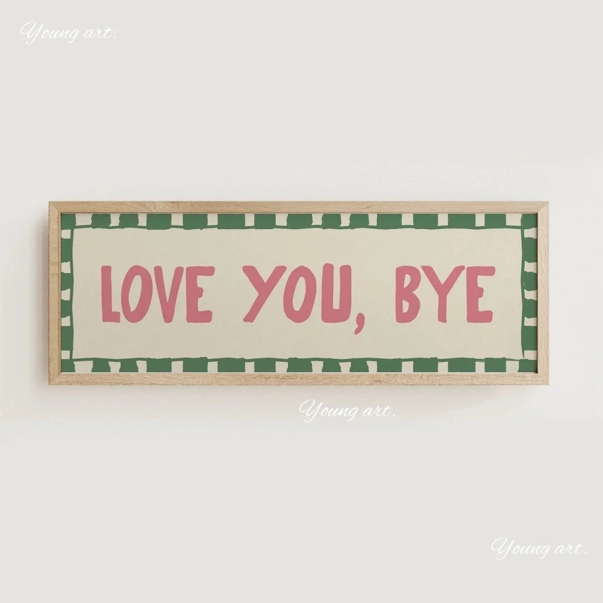 A framed canvas print with the text LOVE YOU BYE in pink lettering on a beige background with a green border.