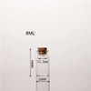 A clear glass bottle with a cork stopper is shown next to a measurement scale, indicating an 8mL volume and dimensions of 12.