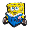 A yellow SpongeBob SquarePants face charm with large eyes and a book, set in black and blue.