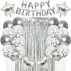 Silver and gold balloons with happy birthday lettering and tinsel streamers