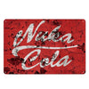 A vintage rusty red metal wall sign with white script lettering that reads Nuka Cola.