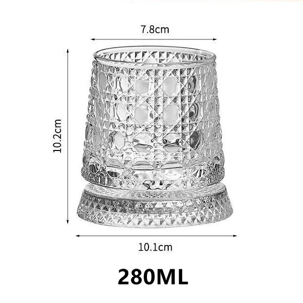 A clear crystal whiskey glass with a relief pattern, measuring 7.8cm high and 10.1cm wide.