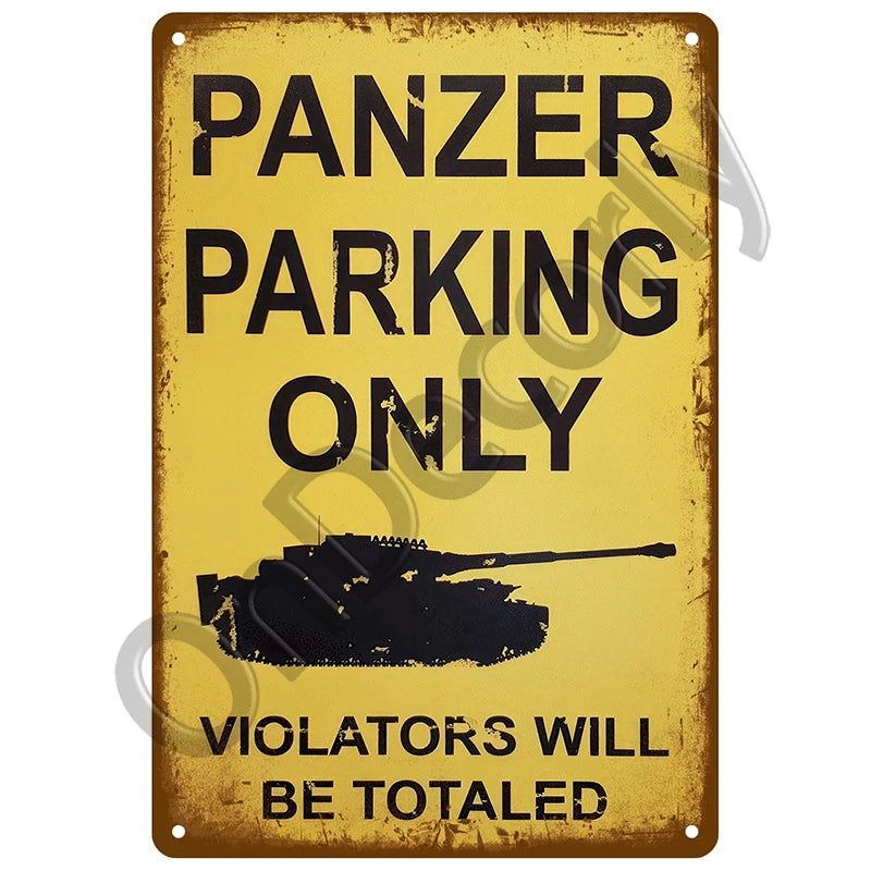 A vintage yellow metal sign with black text warning that only tanks are allowed and violators will be totaled.