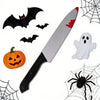 A collection of Halloween props including a bat silhouette, a pumpkin, a knife, and a ghost, all set against a white backgrou