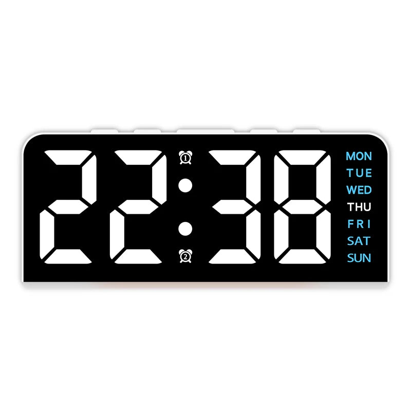 A black digital alarm clock displaying 22:38 with a mood light feature.