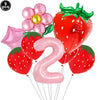 A party kit featuring nine pink and red strawberry-shaped balloons and a large pink number two balloon.