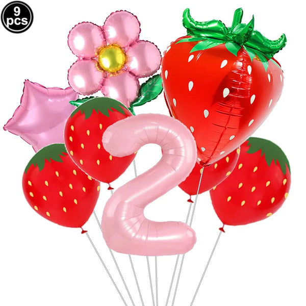 A party kit featuring nine pink and red strawberry-shaped balloons and a large pink number two balloon.