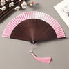 Traditional Bamboo Folding Fan with Solid Color Design