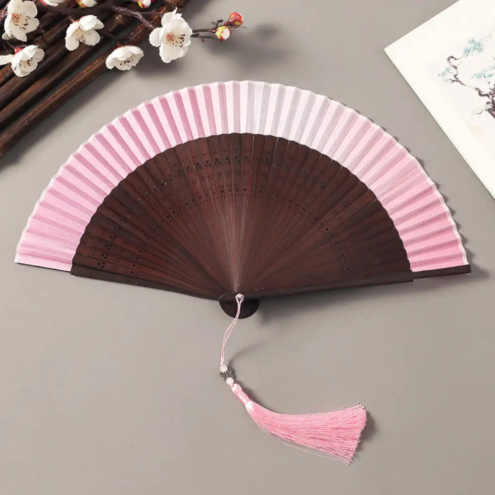 Traditional Bamboo Folding Fan with Solid Color Design