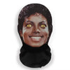A dark mask resembling a celebrity face with yellow eyes.