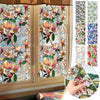 Botanical print static cling window film featuring pink and peach flowers on a glass panel.