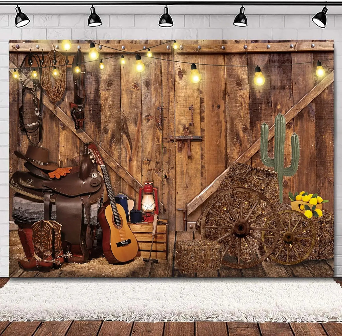 A rustic wooden barn door backdrop featuring a cowboy theme with leather goods, tools, and a cactus.