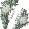 A floral arrangement featuring white and light blue roses and greenery for a wedding arch kit.