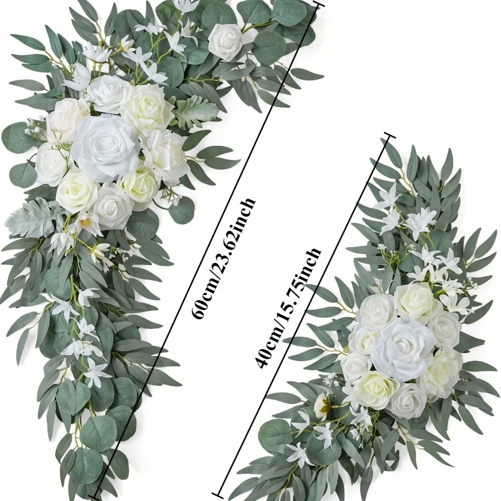 A floral arrangement featuring white and light blue roses and greenery for a wedding arch kit.