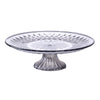 Clear acrylic serving plate with a decorative pattern and pedestal base.