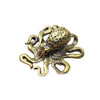 Antique brass octopus desk ornament with detailed texture and tentacles