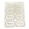 A sheet of thank you seal stickers for crafting and packaging featuring gold-edged thank you messages.