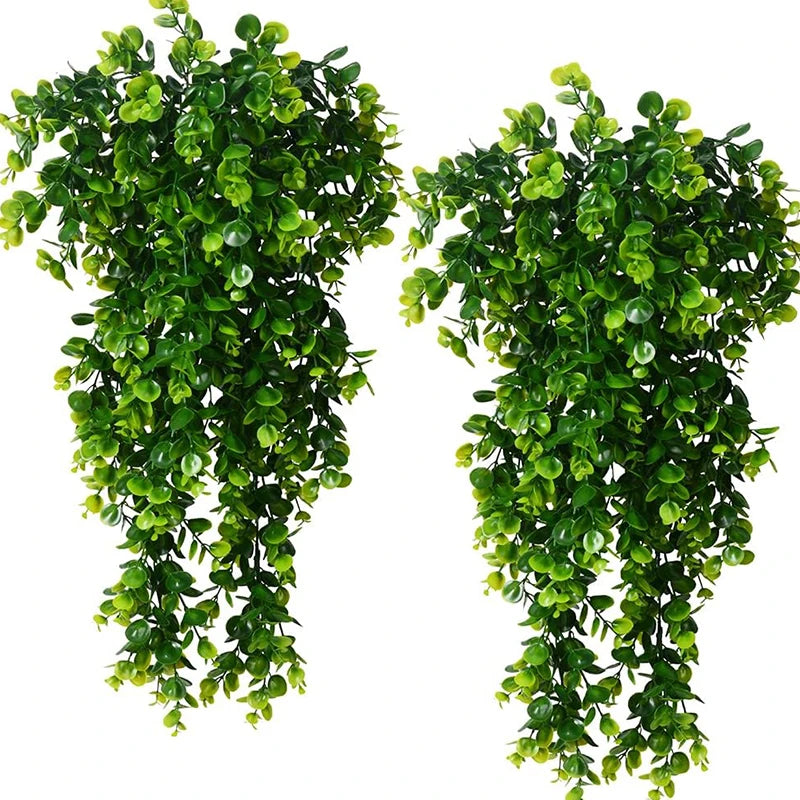 Two bunches of artificial eucalyptus leaves used for home decor