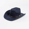 A dark navy wool cowboy hat with a studded leather band shown from above.