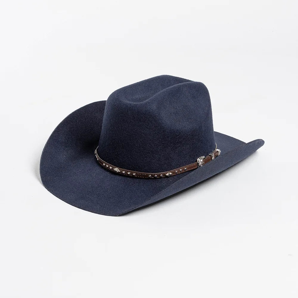 A dark navy wool cowboy hat with a studded leather band shown from above.