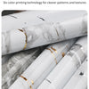 Rolls of white marble contact paper featuring gray veining and gold accents for DIY decor